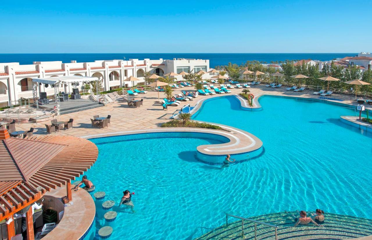 שארם א-שייח Sunrise Montemare Resort -Grand Select (Adults Only) מראה חיצוני תמונה A swimming pool at a resort in Egypt